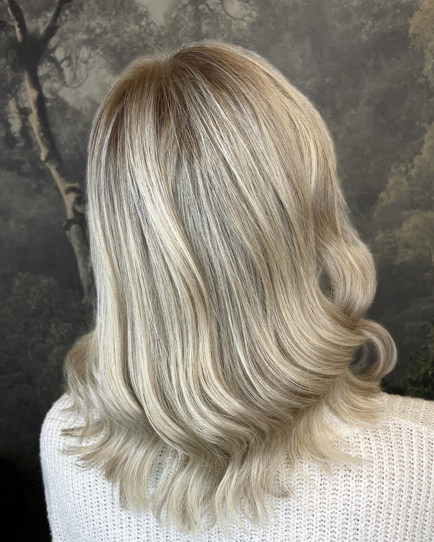 Bright icy blonde colour with smooth styling